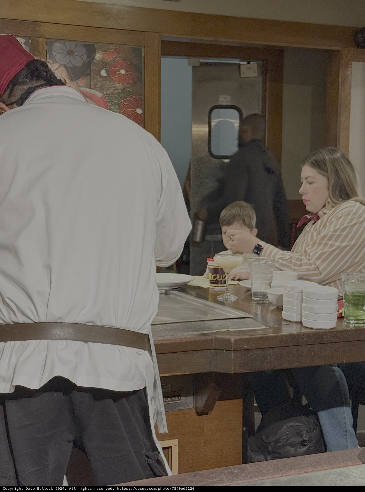 Family Meal at Japanese Restaurant Counter