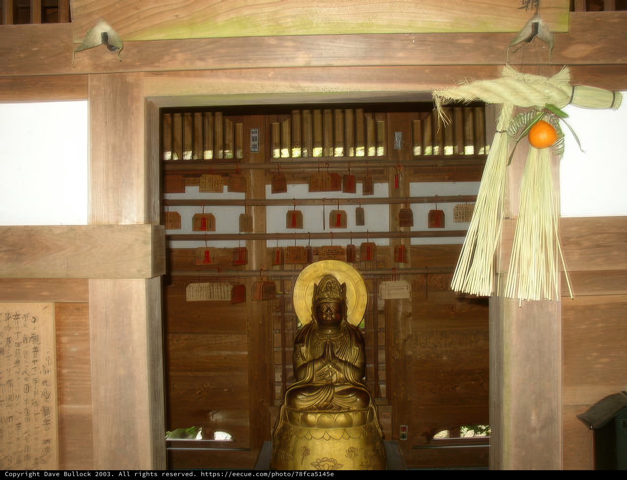 Buddha Statue in Monastery Doorway