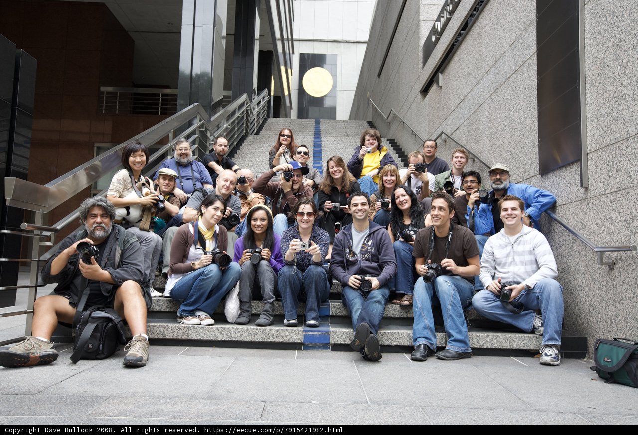 Group of Photographers Capturing the Moment on the Steps