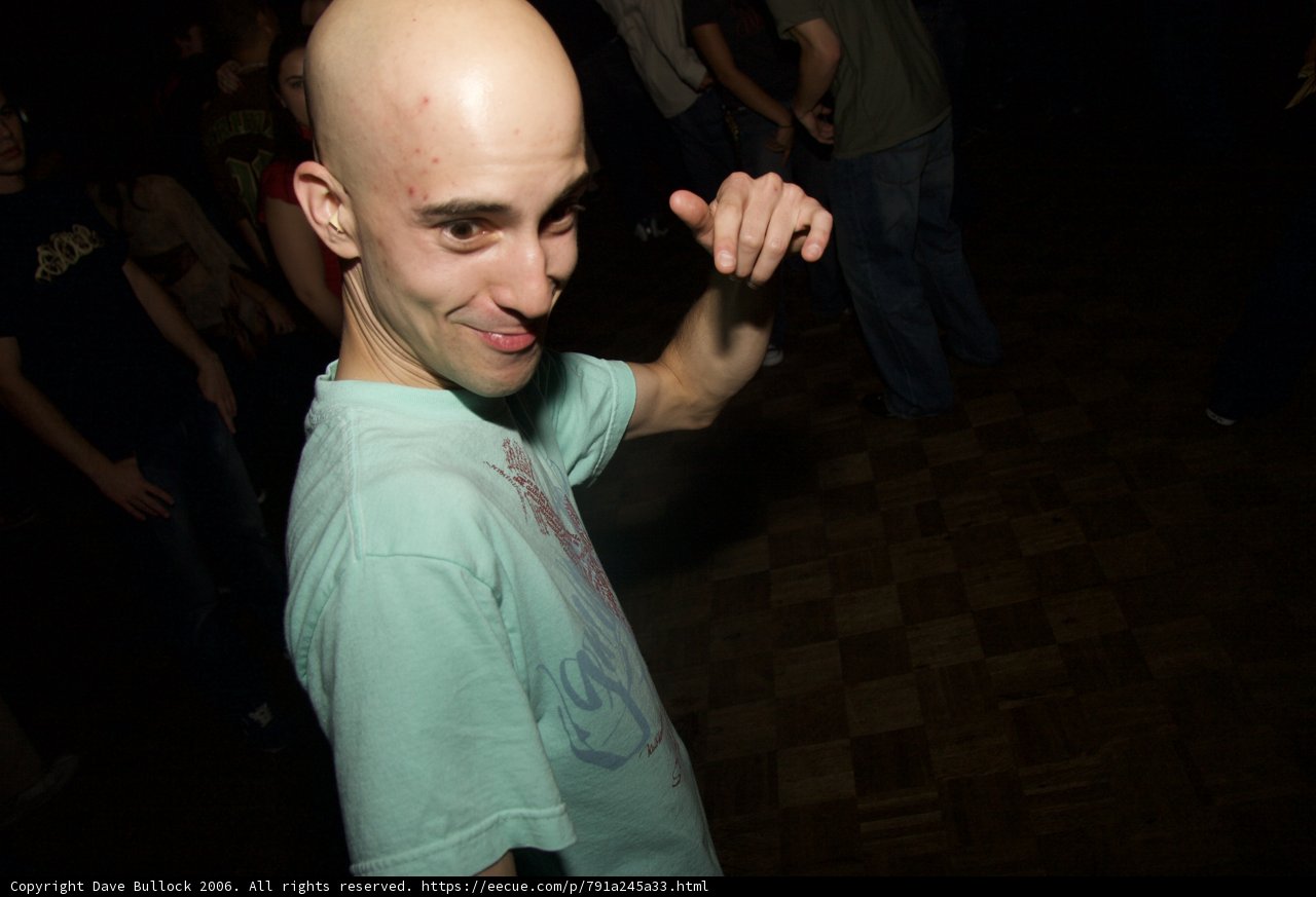 Bald-Headed Man in Club