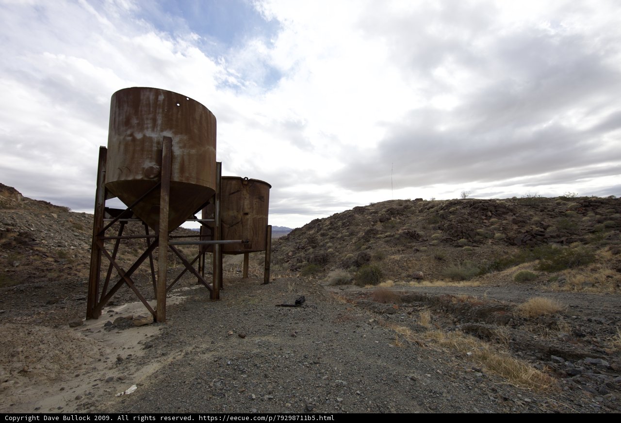 Rusty Water Tanks in the Desert