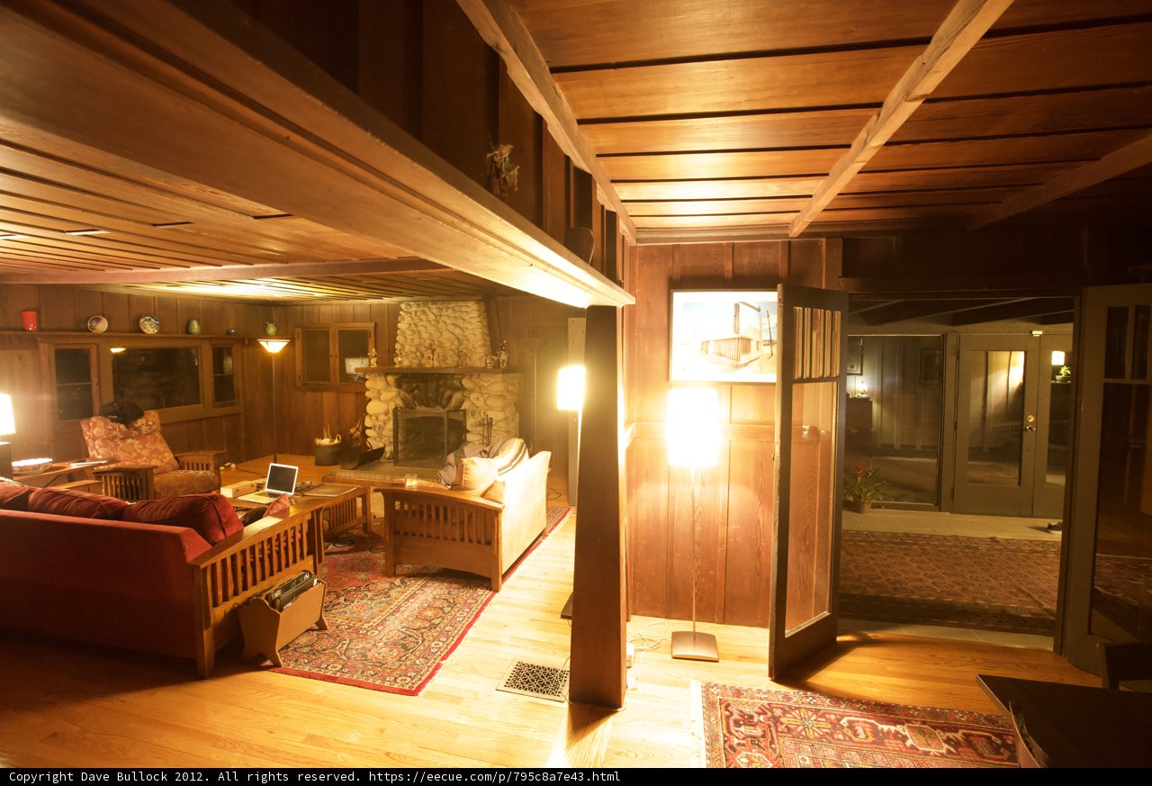 Cozy Living Room with Fireplace and Three Couches