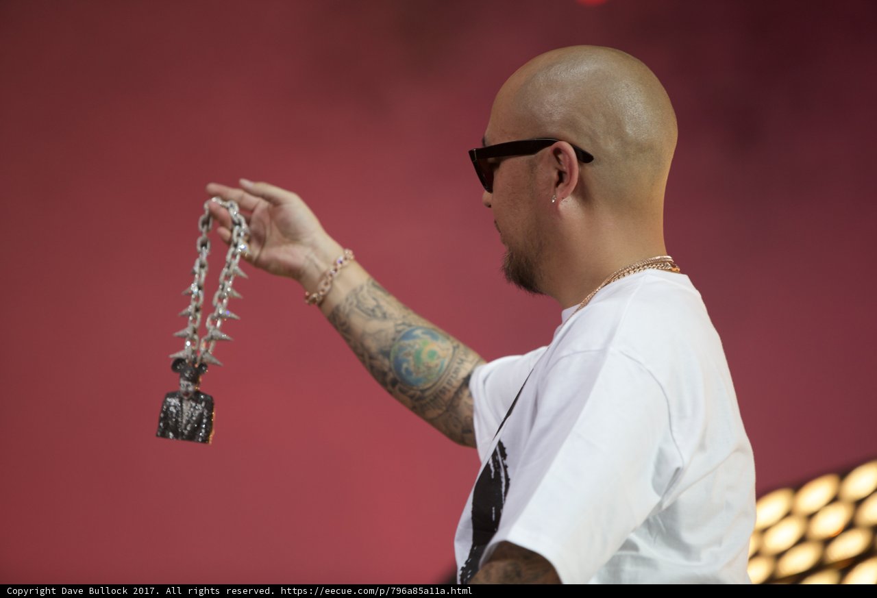 Tattooed Man with Chain