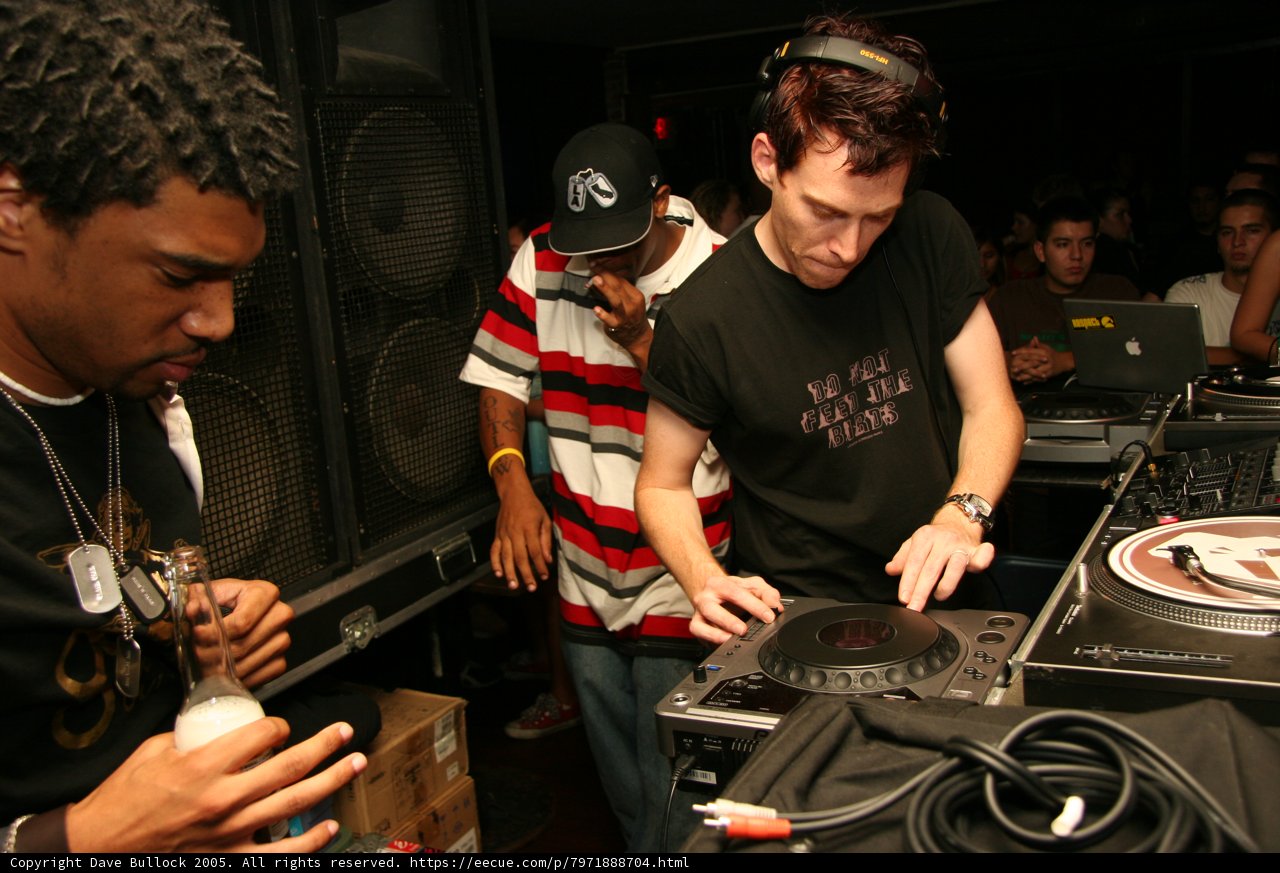 DJ Chris L in Black Shirt and Baseball Cap