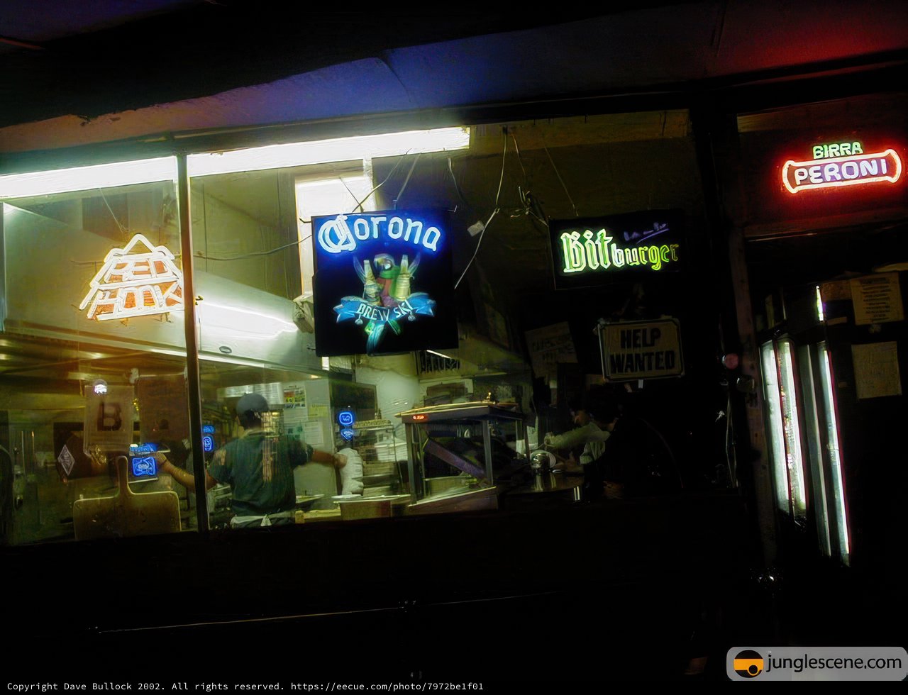 Neon lights at a busy restaurant