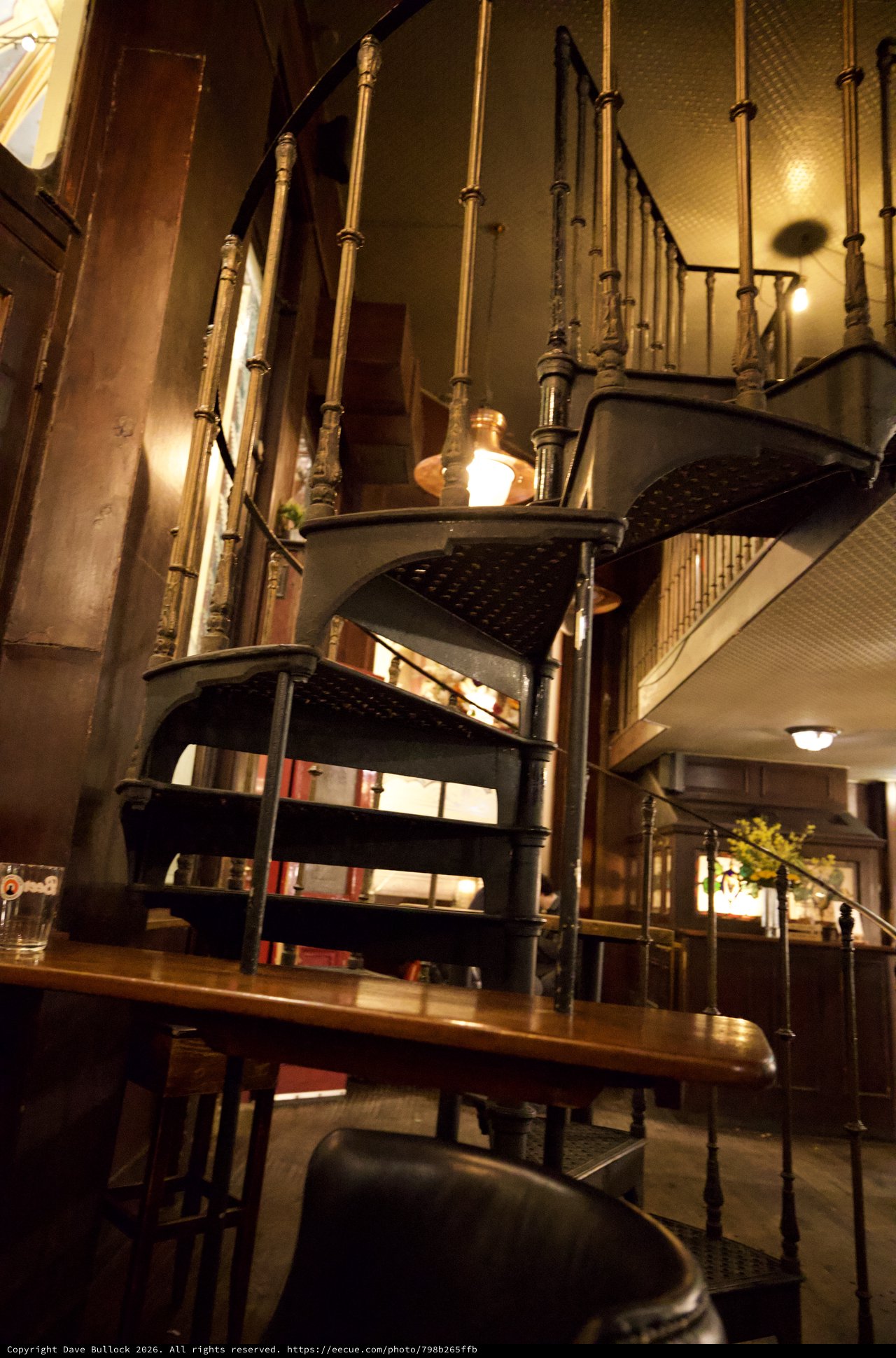 Atmospheric Interior of Historic London Bookshop with Spiral Staircase