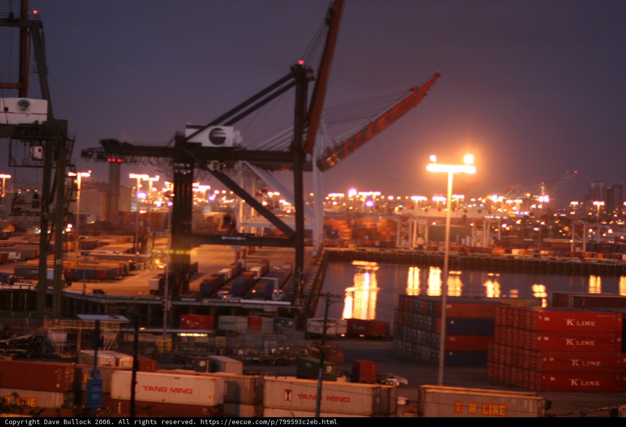 Red Crane in Waterfront Construction Site