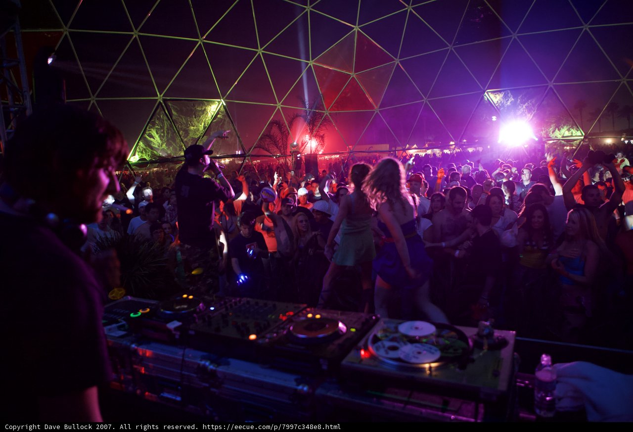DJ Entertains Revellers in a Night Club