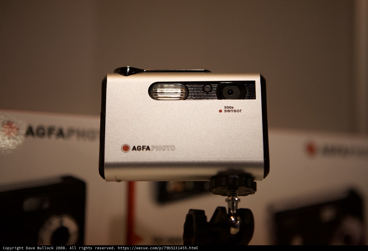 Silver Camera with Black Strap