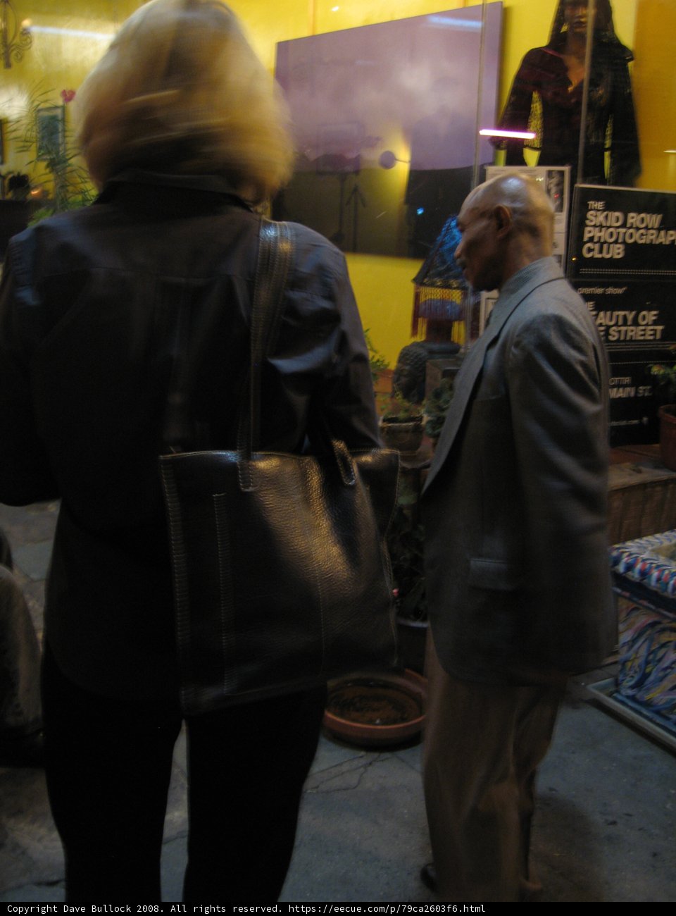 Stylish Woman with Overcoat and Handbag