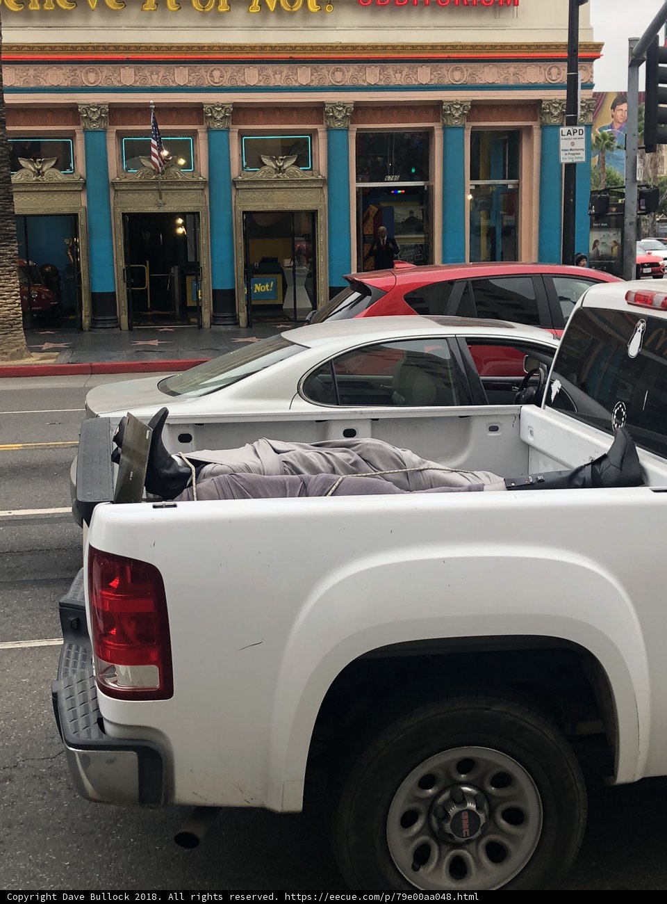 White Pickup Truck with American Flag