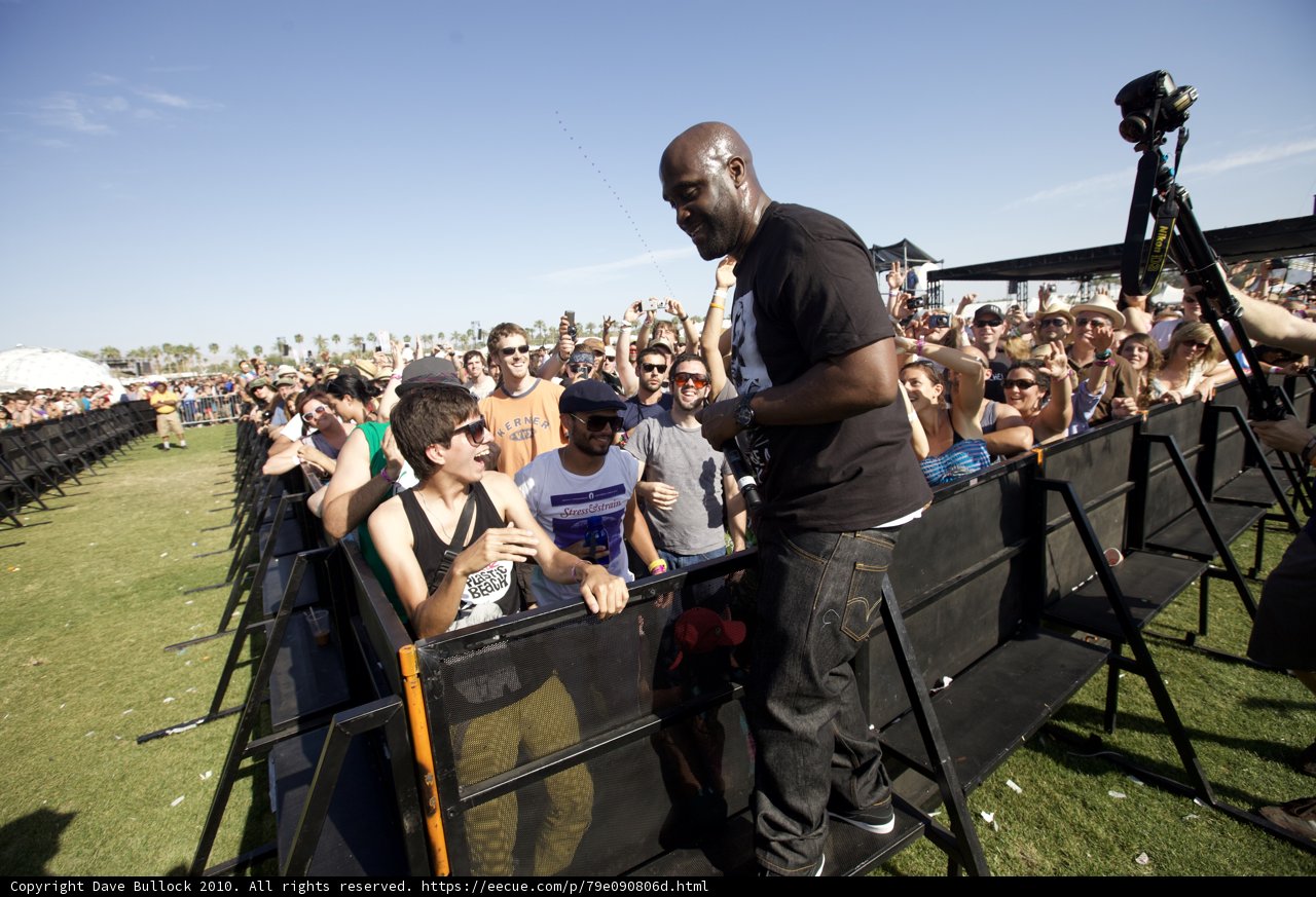 Man in Black Shines under Blue Sky at Coachella Sunday