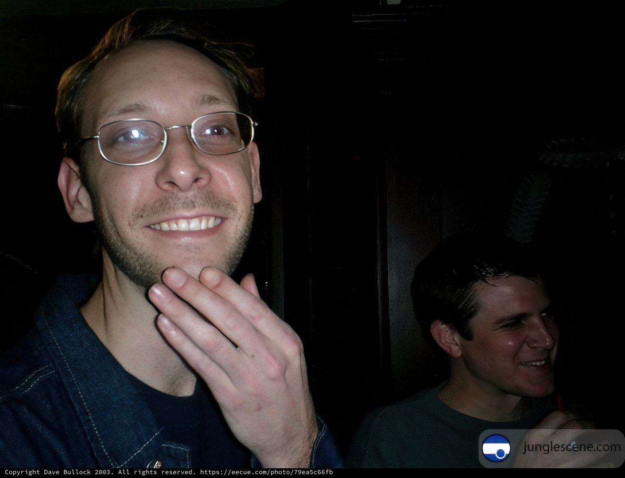 Smiling Bearded Man with Glasses