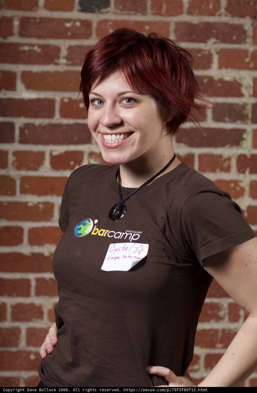 White Tag on a Happy Woman's Shirt