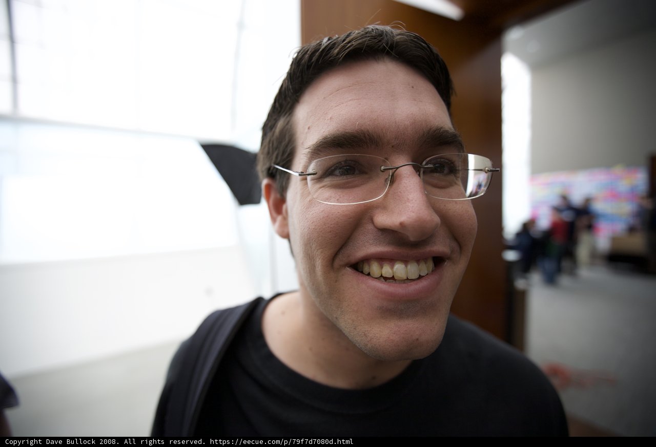 Smiling Man with Glasses