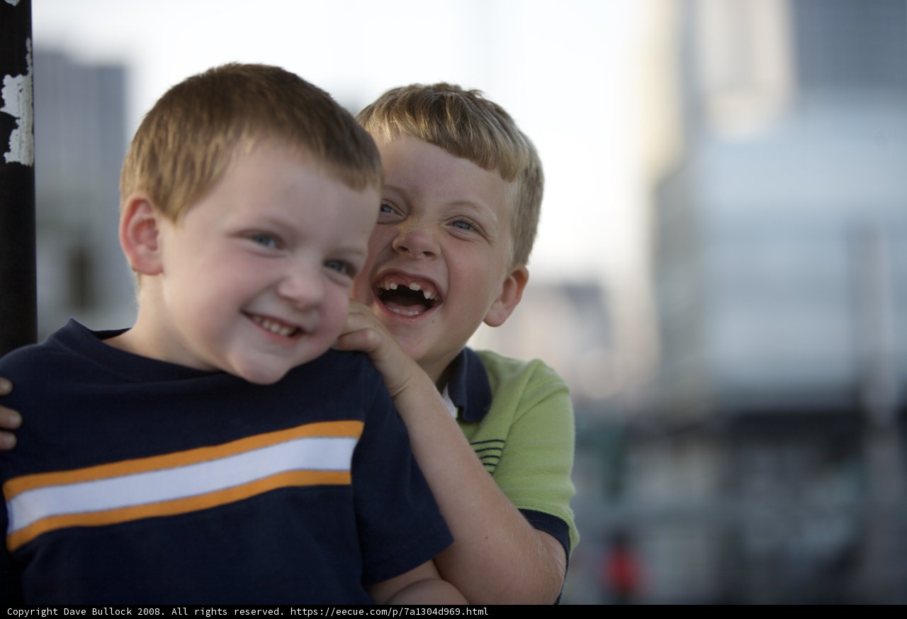 Joyful Smiles of Two Young Boys