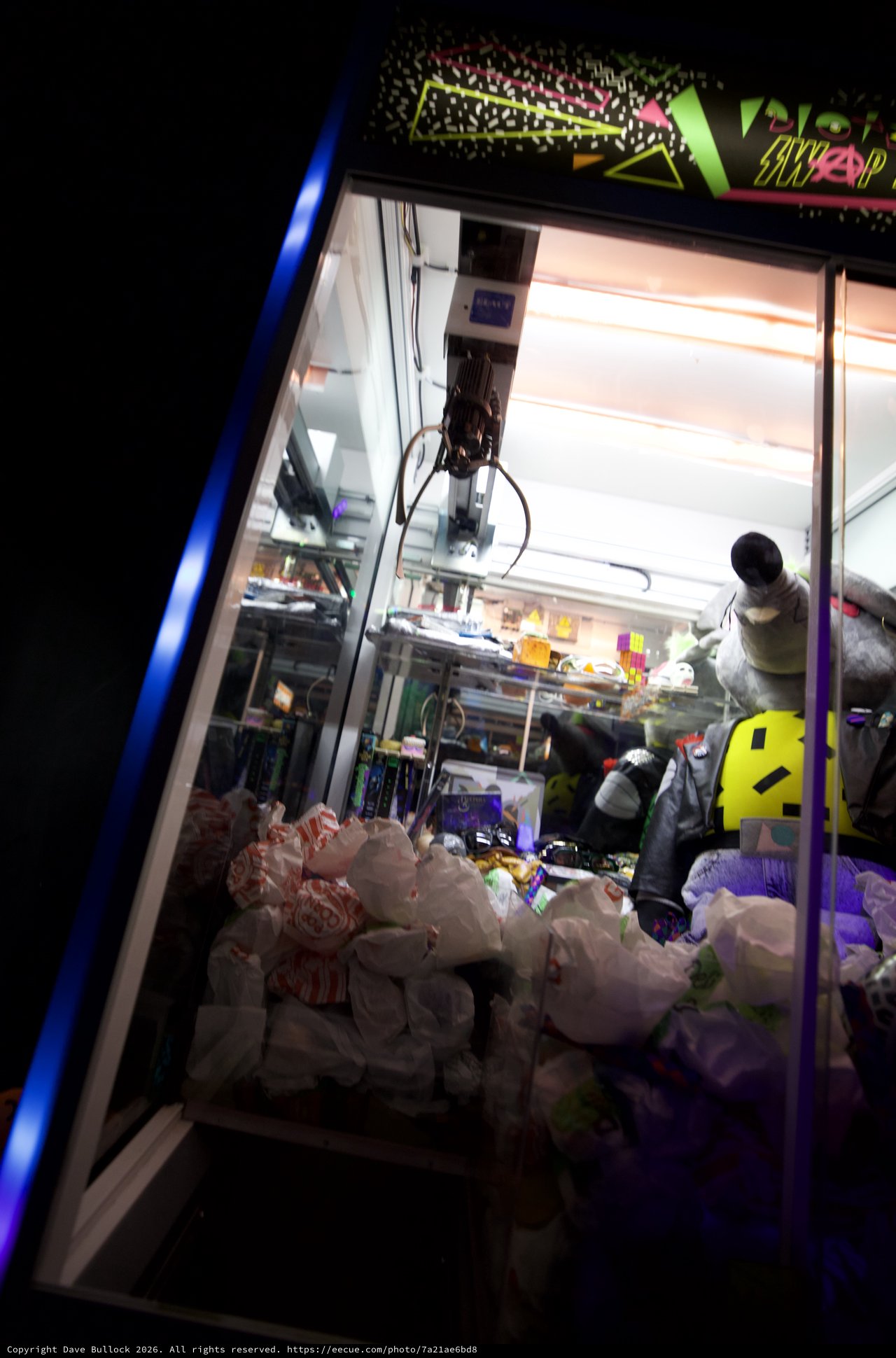 Claw Machine Arcade Game at Night