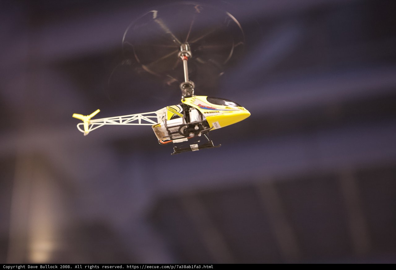 Soaring Yellow Helicopter