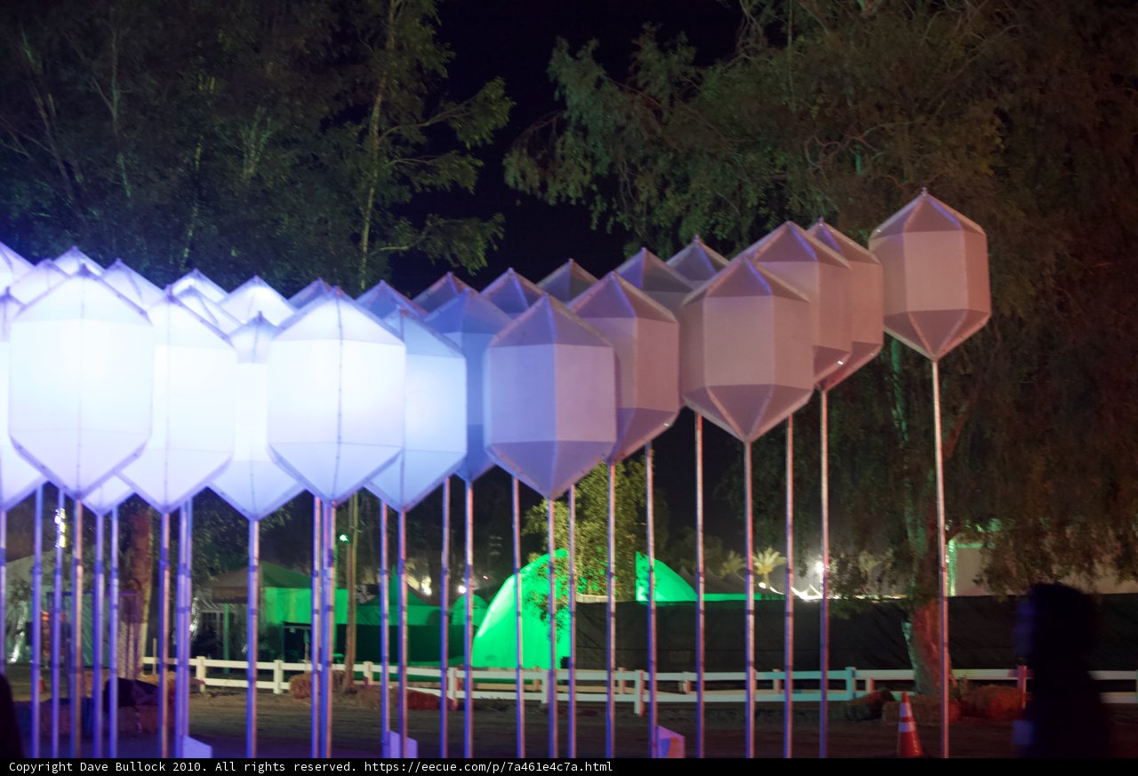 Illuminated Kites in Night Sky