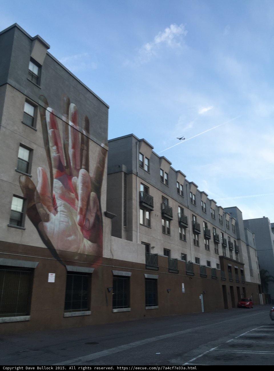 Hands and Contrail