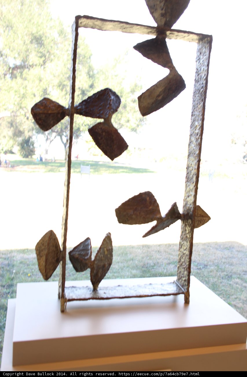 Bronze Bird in a Machine Frame