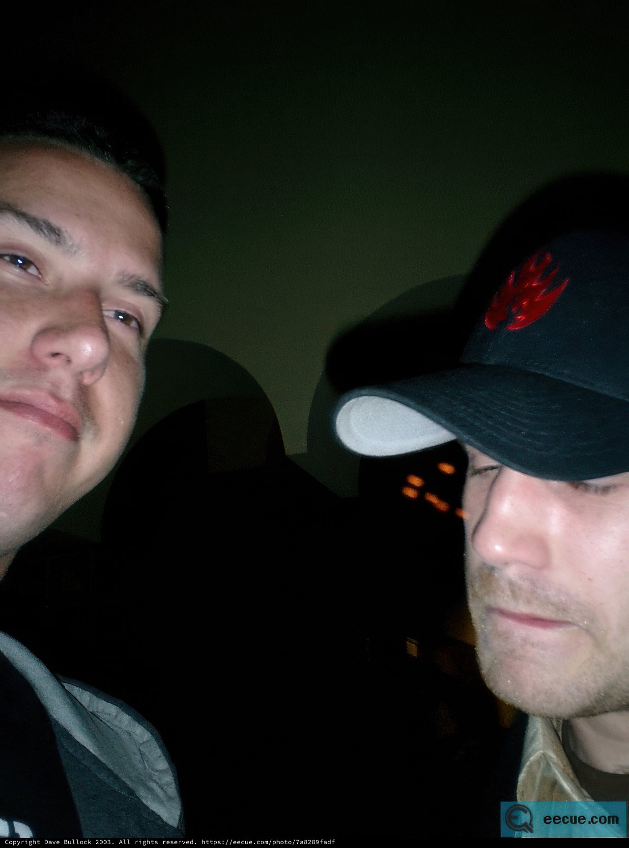 A Conversation Between Two Hat-Wearing Men