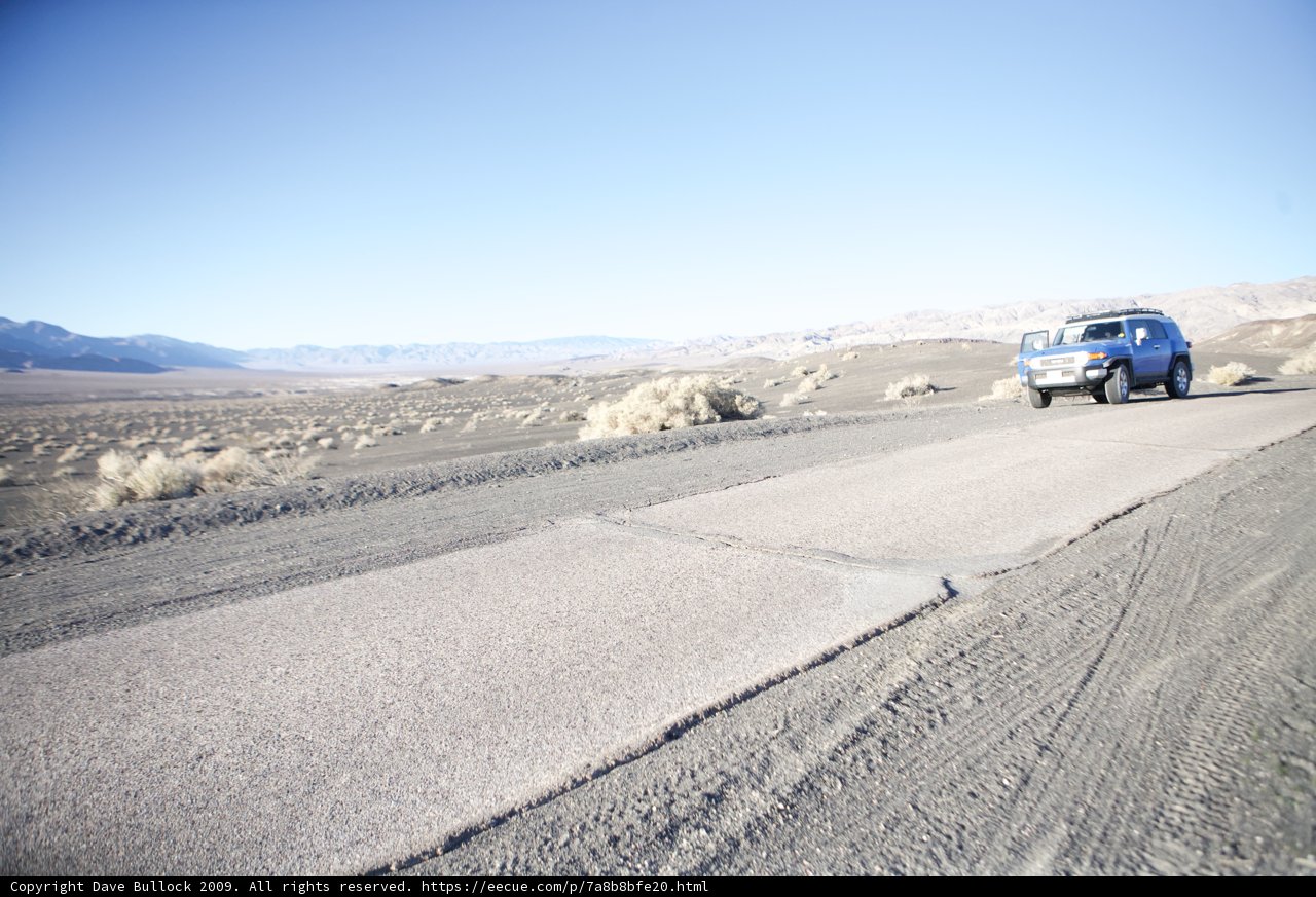 Cruising the Desert in a Blue Jeep