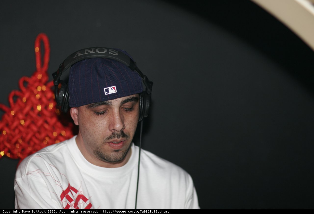 Grooving with Headphones and a Cap