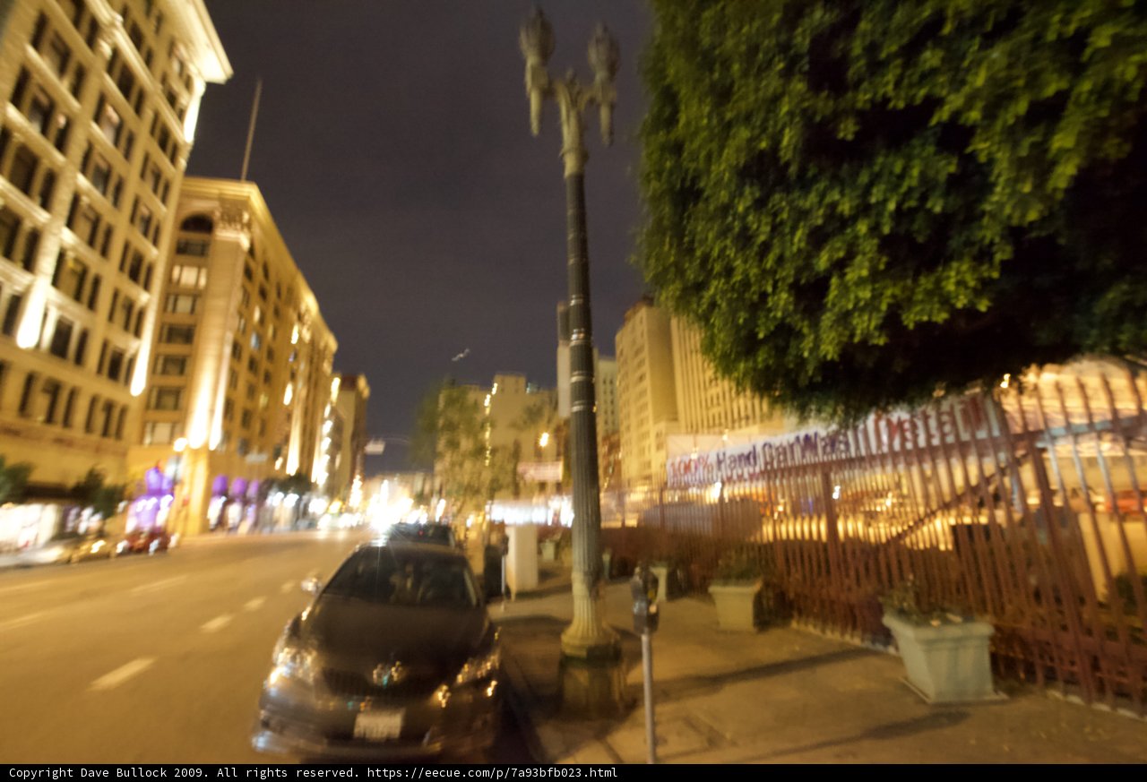 Blurry Metropolis Intersection at Night