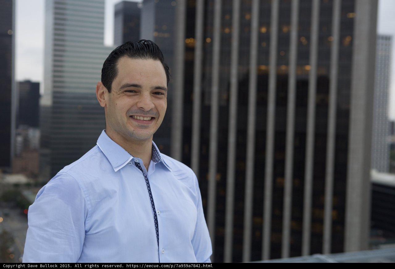 Blue-shirted Man in the City