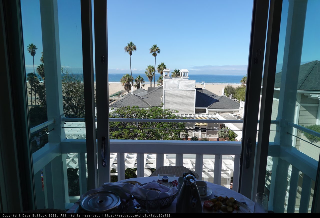 Serenity at Sunrise: A Beachfront Balcony View