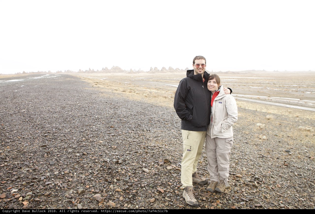Couple Poses on Desolate Desert Road