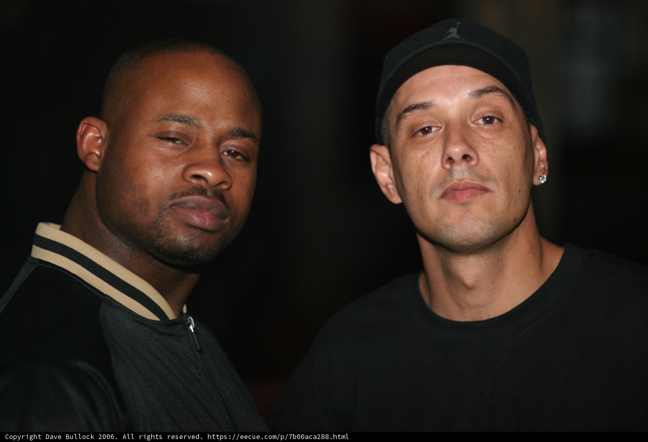 Two Men with Baseball Caps
