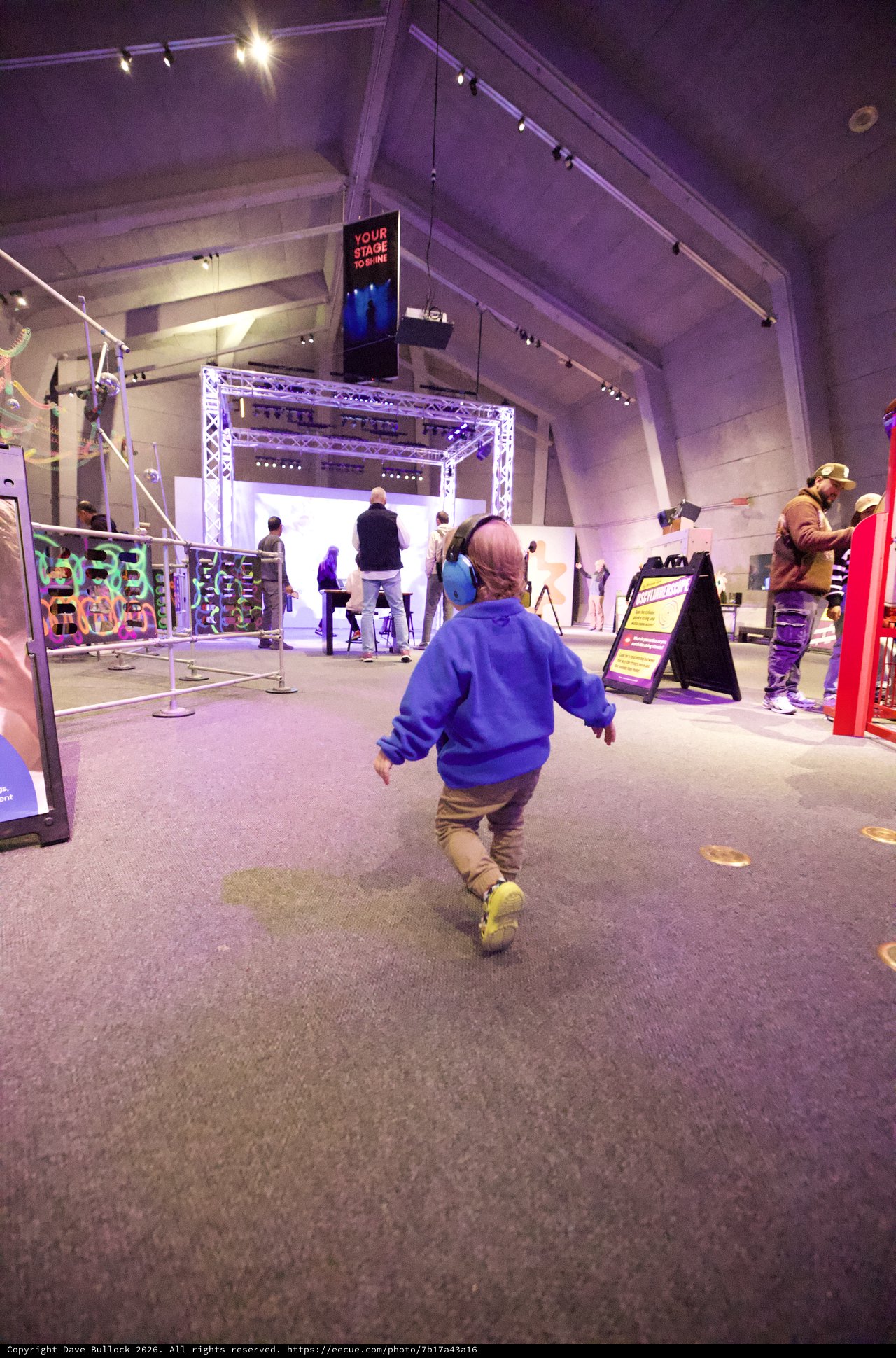 Child Running Through Interactive Museum Exhibition Space