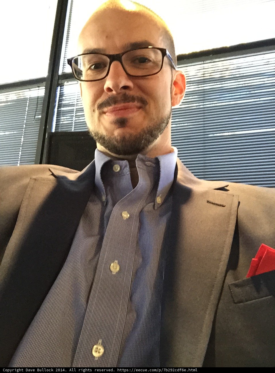 The Suited Smiler