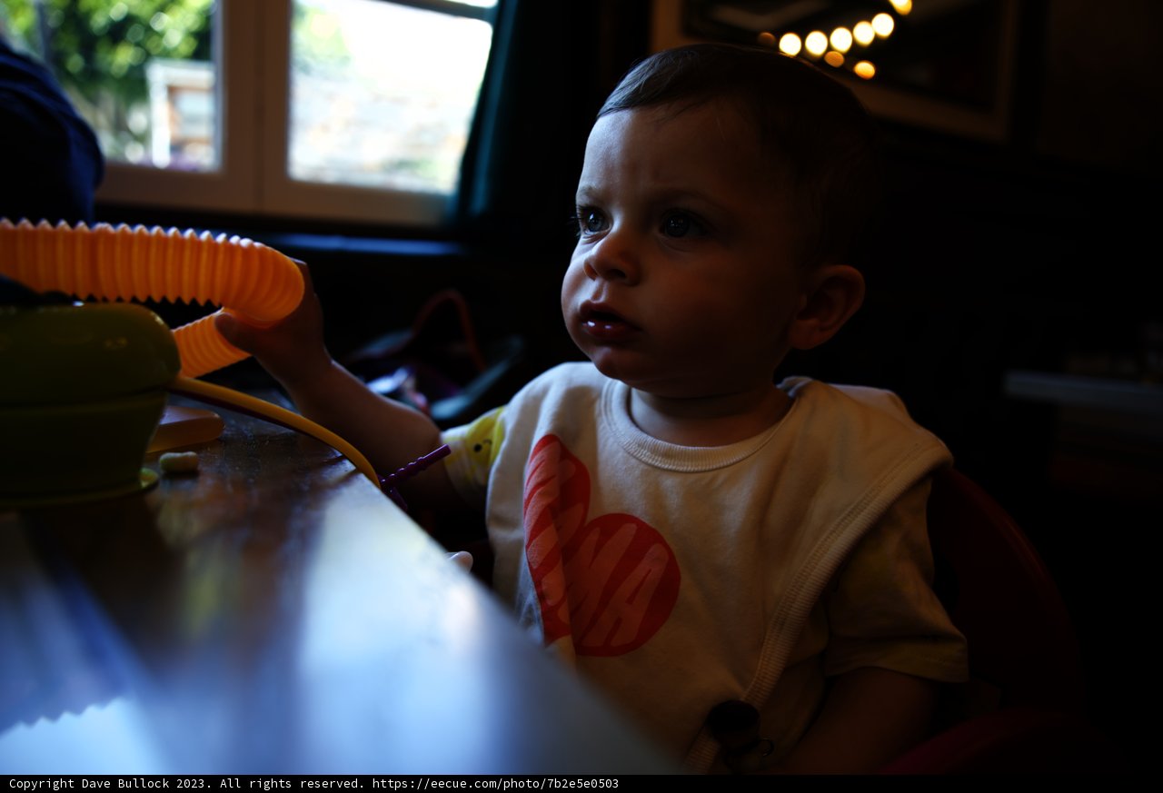 Baby's Playful Mealtime