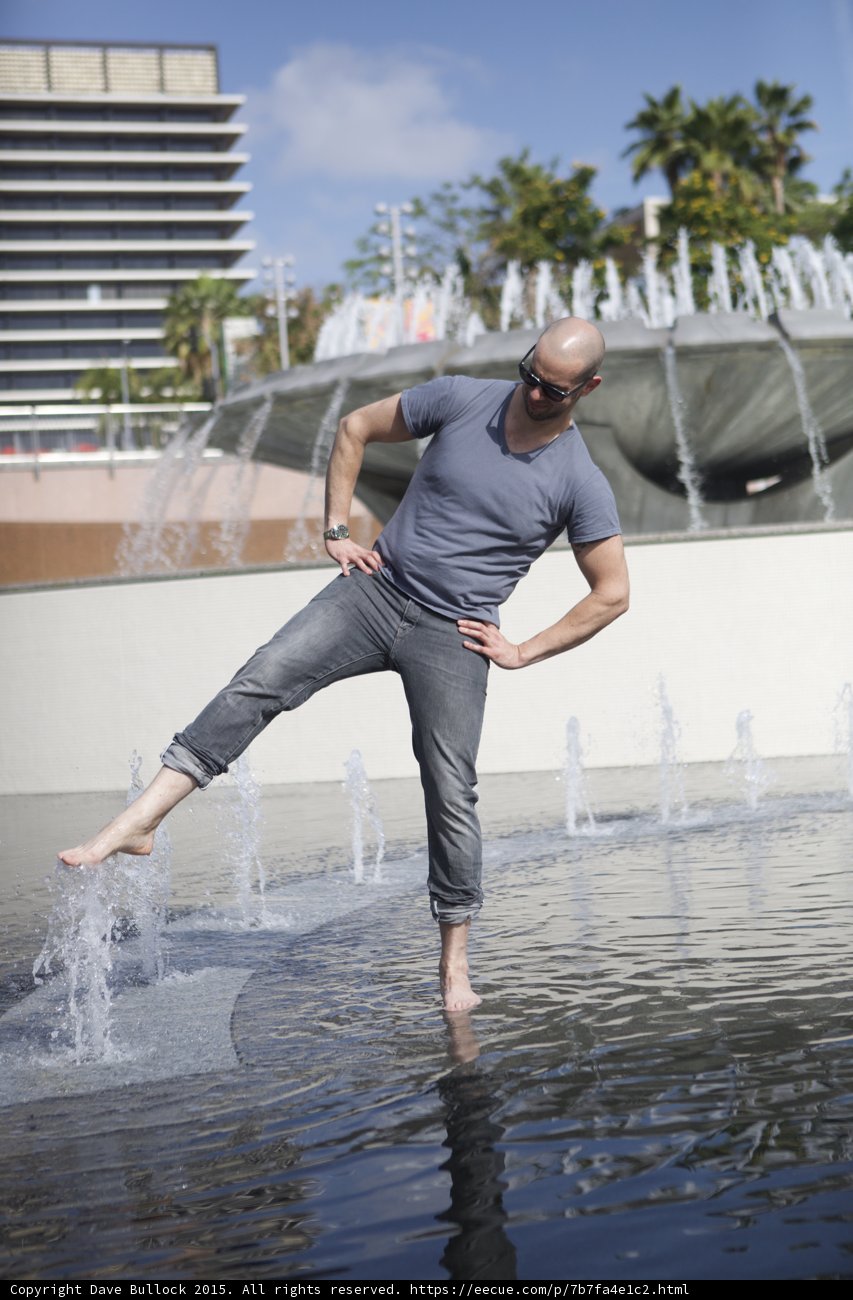 Kicking Water in Fountain