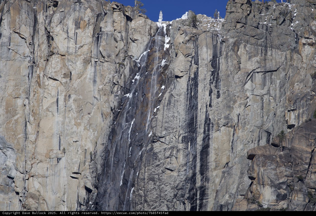 Dramatic Ice-Streaked Granite Cliff Face in Yosemite