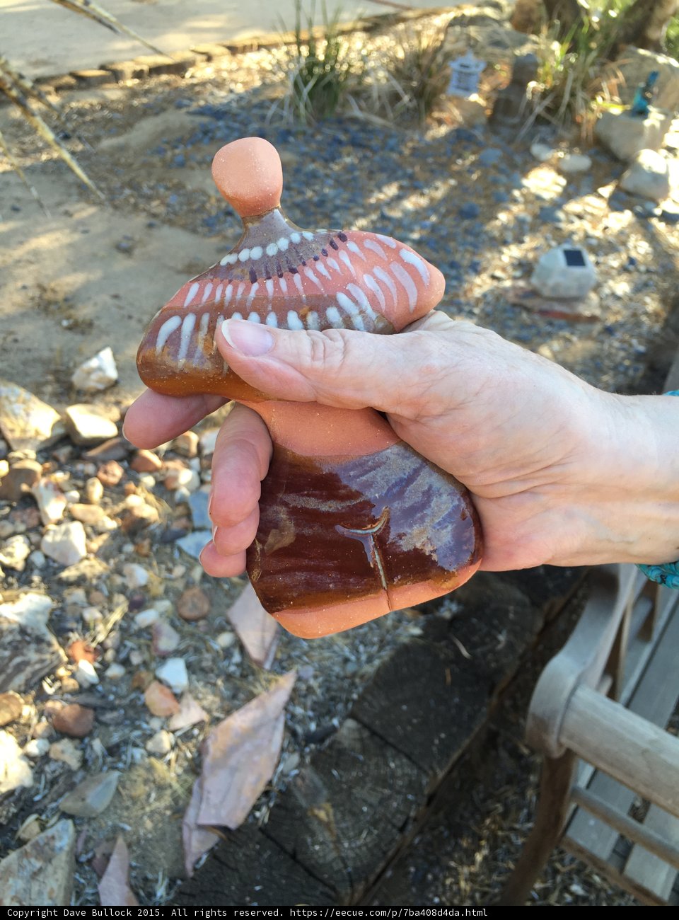 Hand Holding Mysterious Object