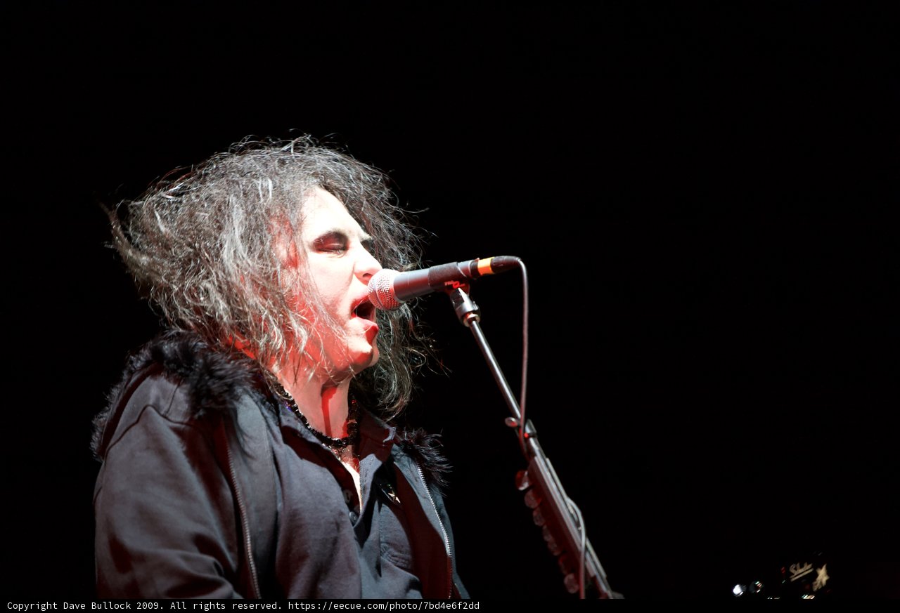 Robert Smith performs at The Cure concert