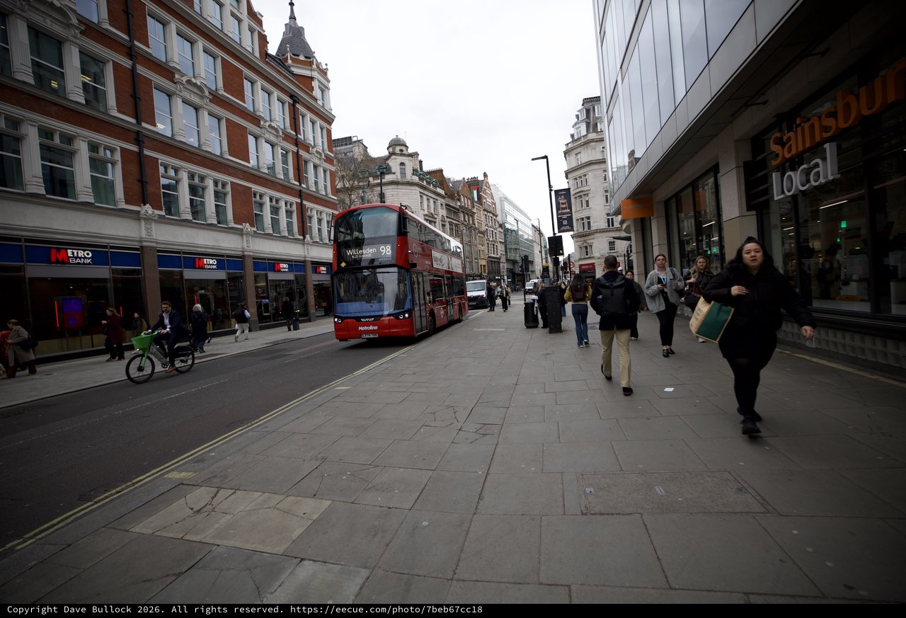 Double-Decker Bus on Busy London Shopping Street