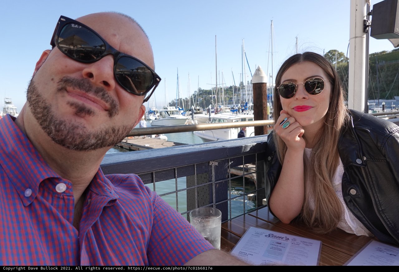 Couple Dining at Waterfront Marina Restaurant