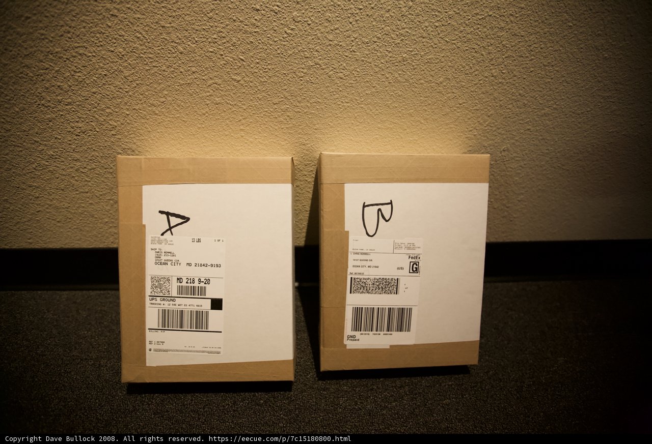 Two Cardboard Boxes with Labels