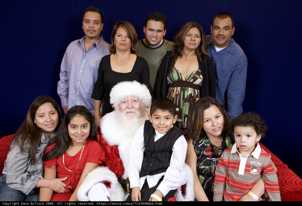 A Happy Family with Santa Claus at APC Christmas Party