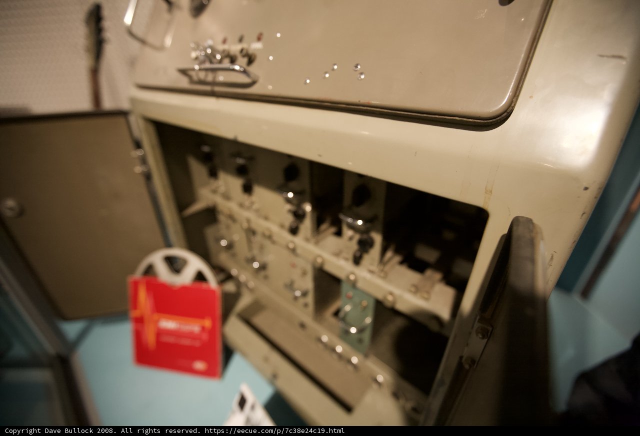 Antique Computer Hardware Machine in Red Box