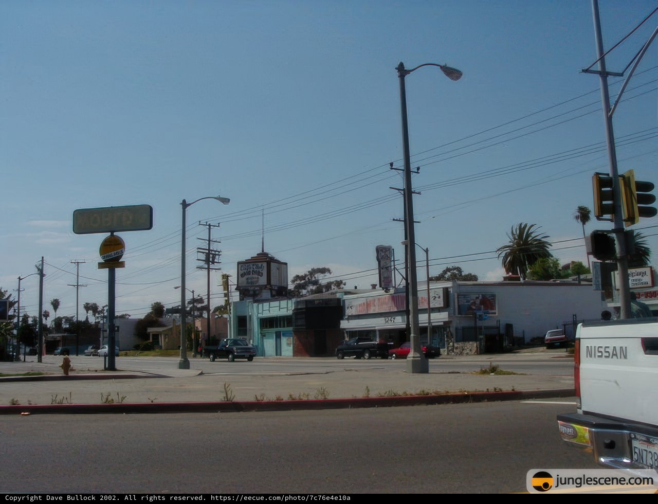 City Intersection with Parked Truck and Traffic Lights