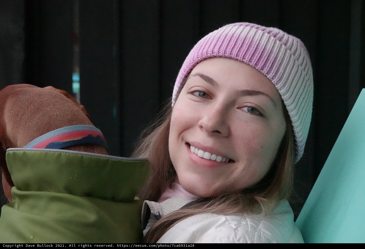 Young Woman Smiling in Winter Beanie