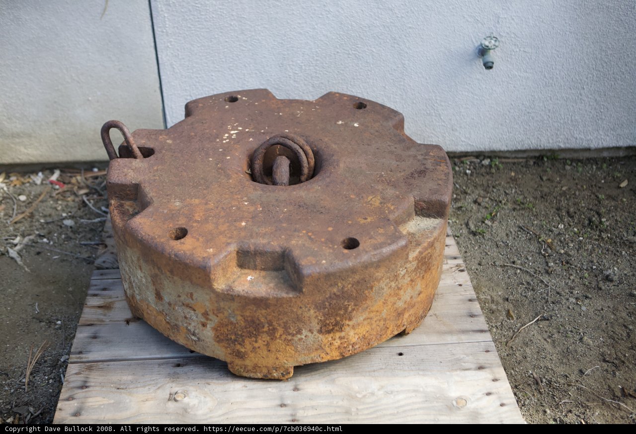 Abandoned Rusty Machine on Wooden Pallet