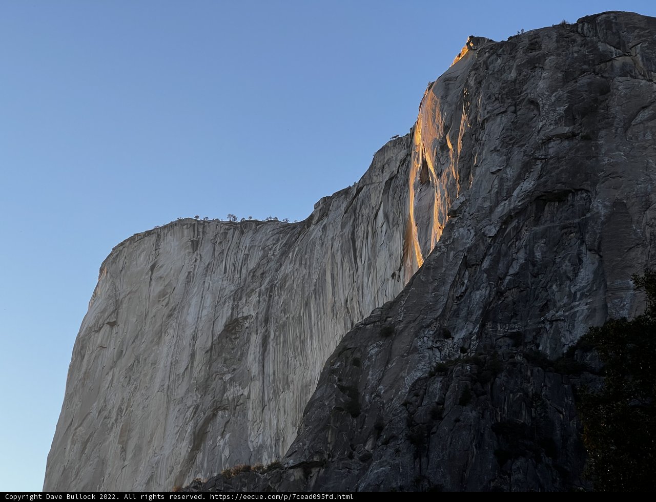 Shimmering Slate: A Mountain Bathed in Sunlight