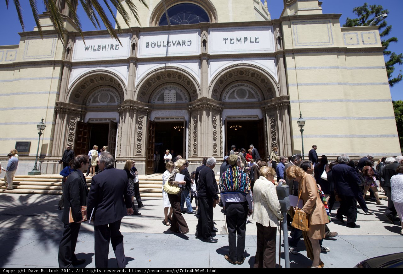Congregation gathering outside historic church